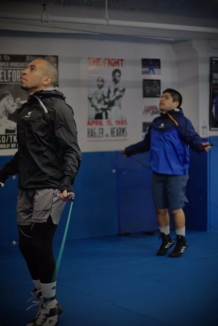 Members skipping rope during conditioning at Ironhand Boxing